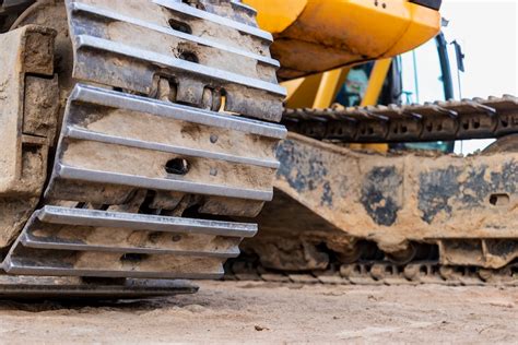 steel tracks vs rubber tracks mini excavator|best skid steer tracks.